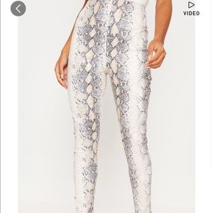 White snakeskin faux leather skinny pants